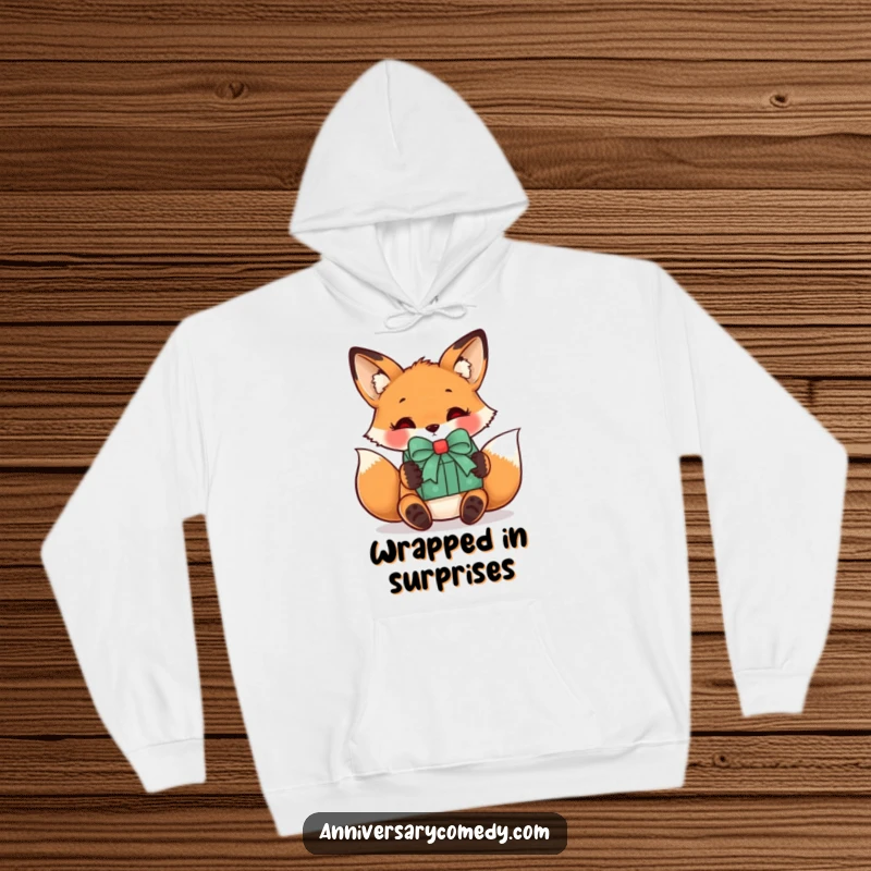 Funny fox hoodie with a curious fox receiving a gift with a bow, ideal for cozying up and celebrating thoughtful presents.